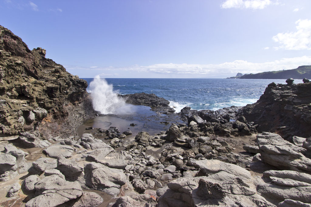 A secondary small blowhole and pool