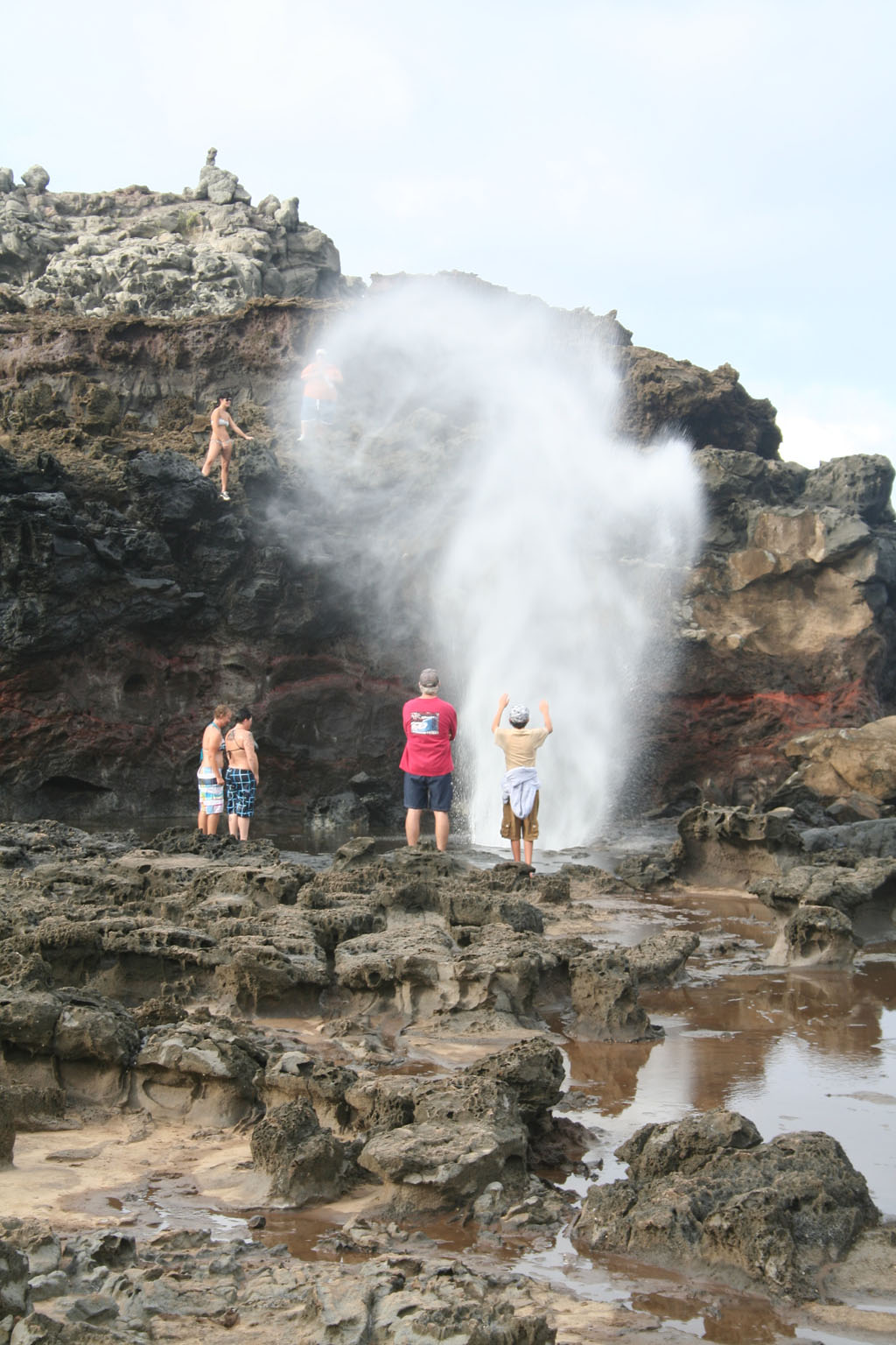 A woman conjures the spirit of the blowhole
