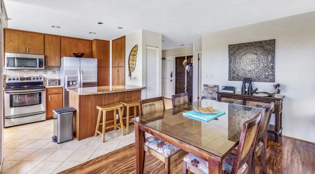 Dining table with kitchen in background