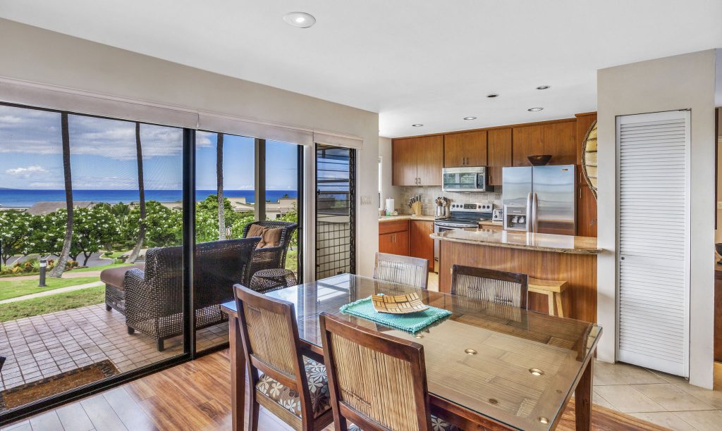Dining table, kitchen and lanai