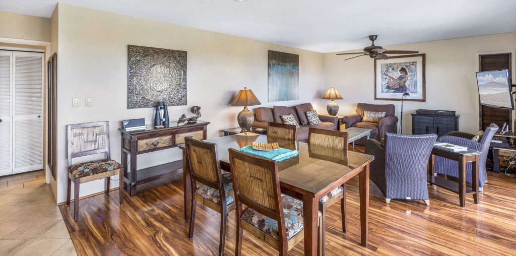 Dining table with living room in background